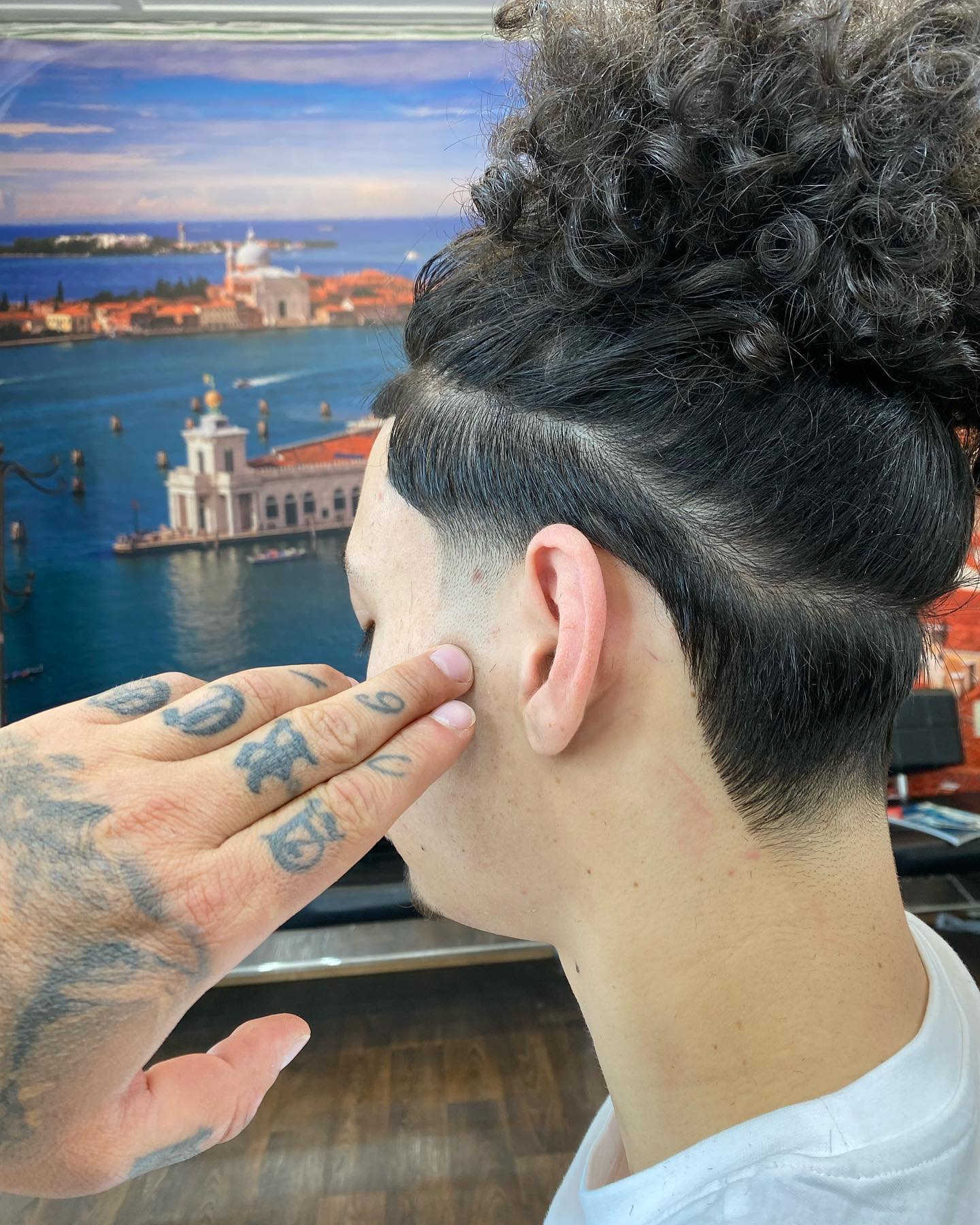 Curly top with taper fade